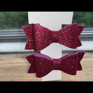 Pair of magenta hair bows